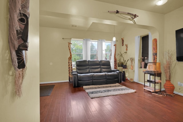 living room with dark wood-type flooring