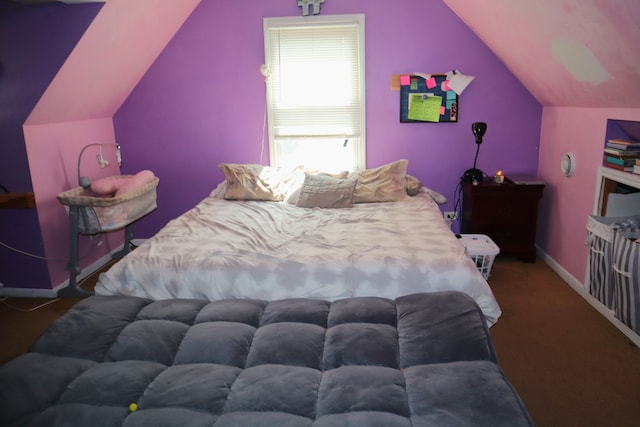 bedroom with lofted ceiling