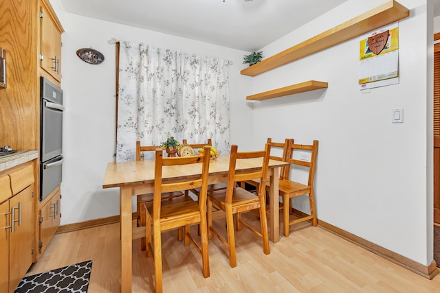 dining room featuring light hardwood / wood-style floors