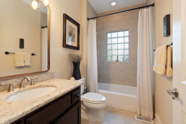 full bathroom with shower / tub combo, toilet, tile patterned flooring, and vanity