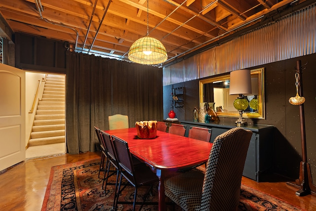 dining room featuring concrete floors