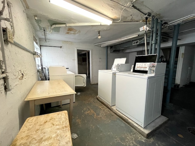 basement with separate washer and dryer