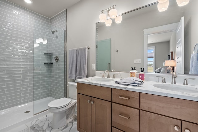 bathroom with tile patterned floors, toilet, walk in shower, and vanity