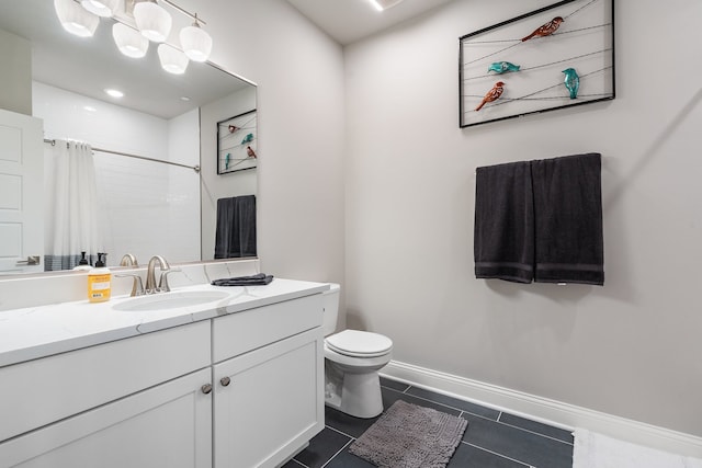 bathroom with tile patterned flooring, curtained shower, vanity, and toilet