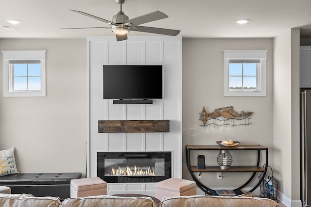 living room featuring ceiling fan