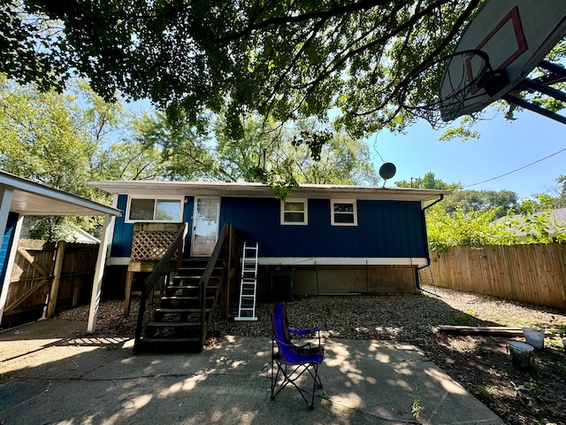 view of front of property with a patio