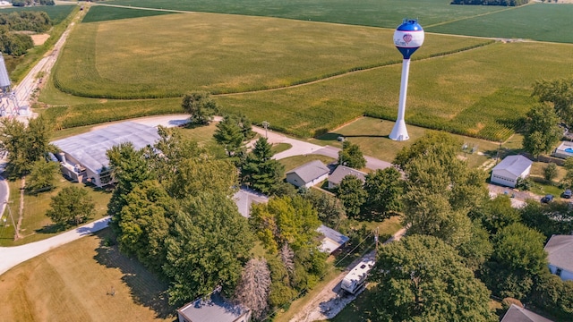 birds eye view of property with a rural view