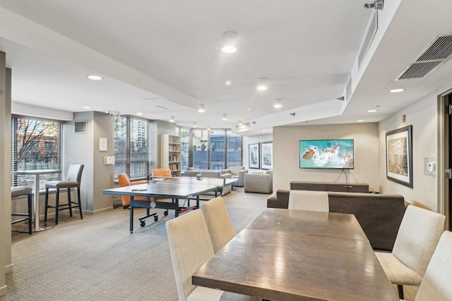 dining space with recessed lighting, visible vents, light colored carpet, and baseboards