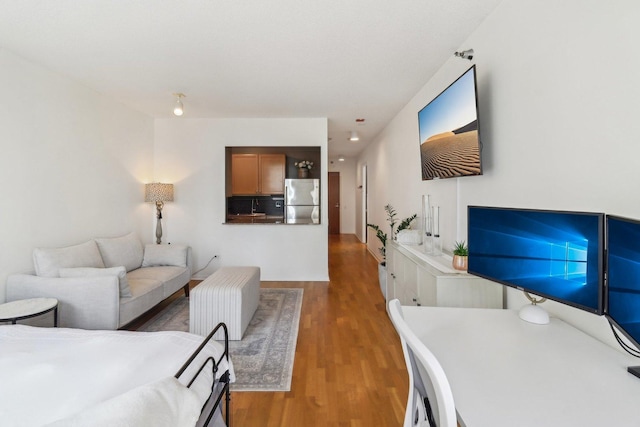 living room with wood finished floors