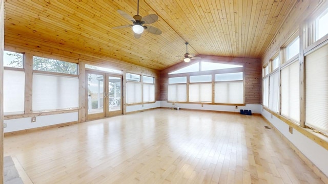 unfurnished sunroom with wood ceiling, ceiling fan, plenty of natural light, and vaulted ceiling