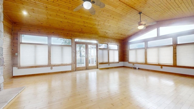 unfurnished sunroom featuring lofted ceiling, french doors, wood ceiling, and ceiling fan