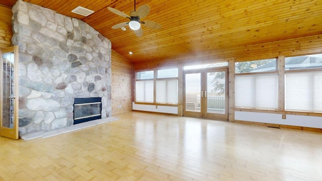 unfurnished living room with light wood-type flooring, a fireplace, wood ceiling, ceiling fan, and lofted ceiling