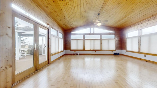 unfurnished sunroom with a wealth of natural light, lofted ceiling, ceiling fan, and wooden ceiling