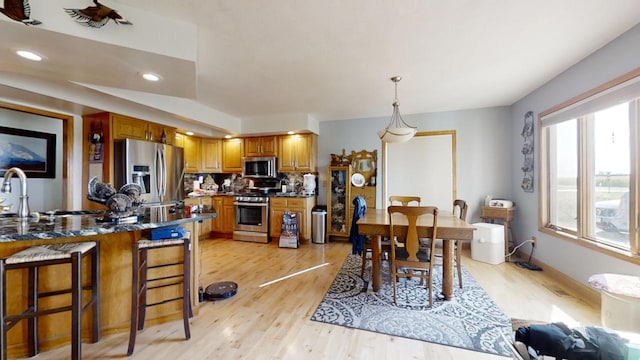 dining room with light hardwood / wood-style floors