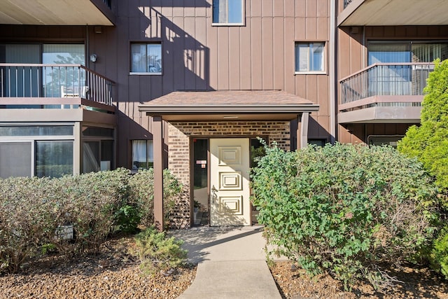 doorway to property featuring a balcony