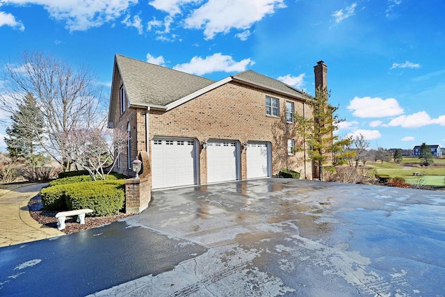 view of property exterior featuring a garage