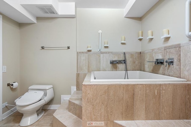 full bath featuring tile patterned flooring, toilet, a bath, and visible vents