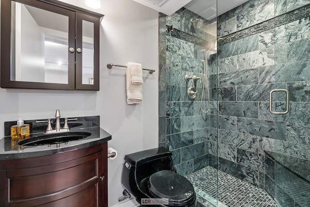 bathroom with vanity and a stall shower