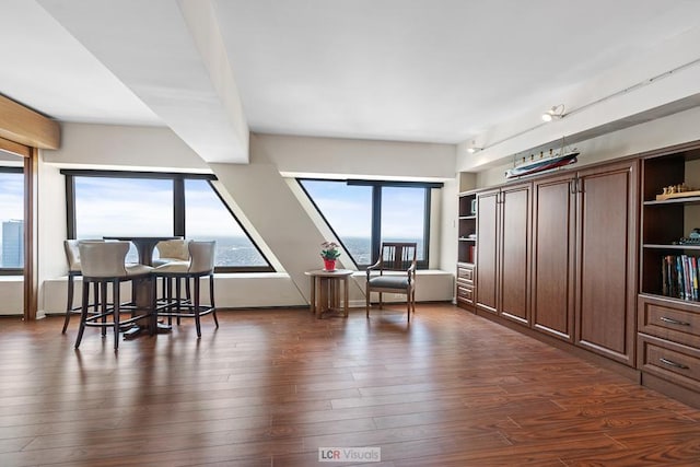 sitting room with dark wood-style floors