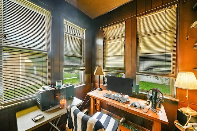 office area featuring wooden walls