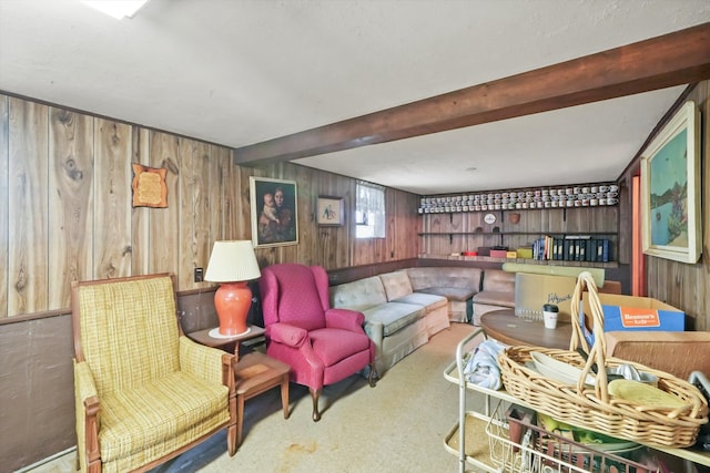 carpeted living room with wood walls and beamed ceiling