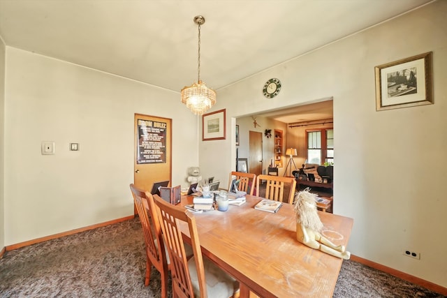 view of carpeted dining space