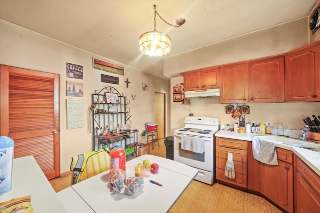 kitchen with white electric range and decorative light fixtures