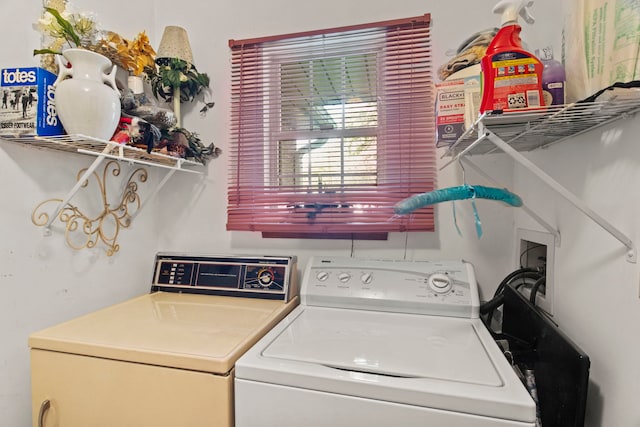 laundry area with laundry area and washing machine and dryer