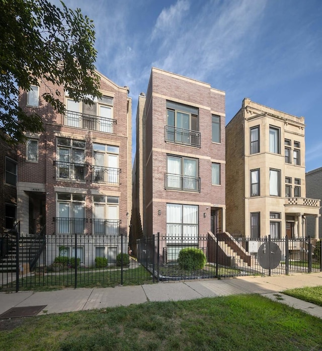 4725 S Saint Lawrence Ave Unit 301, Chicago, IL 60615 - view of property featuring fence private yard