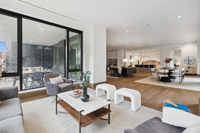 living area featuring recessed lighting and wood finished floors