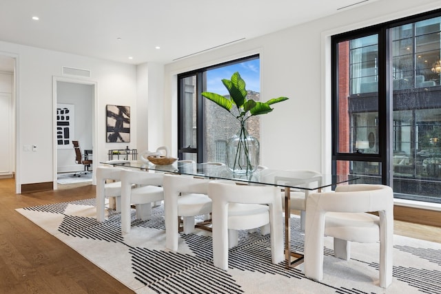21 N May St Unit 402, Chicago, IL 60607 - dining room featuring wood finished floors, recessed lighting, and baseboards