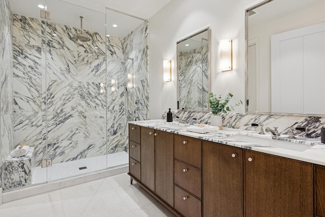 21 N May St Unit 402, Chicago, IL 60607 - bathroom with a marble finish shower, double vanity, and recessed lighting