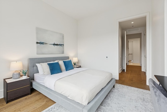 21 N May St Unit 402, Chicago, IL 60607 - bedroom with wood finished floors and baseboards