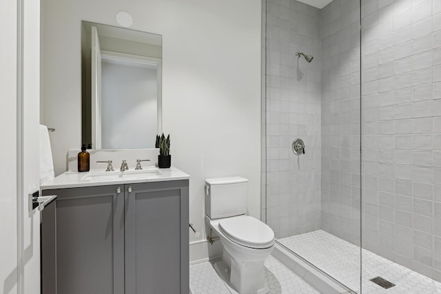 21 N May St Unit 402, Chicago, IL 60607 - full bath featuring tiled shower, vanity, toilet, tile patterned floors, and baseboards