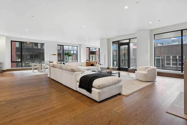 21 N May St Unit 402, Chicago, IL 60607 - living area with wood finished floors, plenty of natural light, and recessed lighting