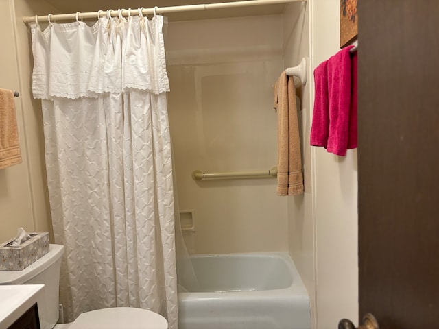 full bathroom featuring toilet, vanity, and shower / tub combo