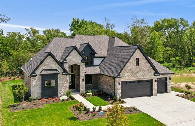 french country home with a front lawn