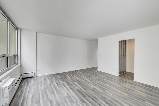 6171 N Sheridan Rd Unit 1508, Chicago, IL 60660 - unfurnished room featuring light wood-style floors