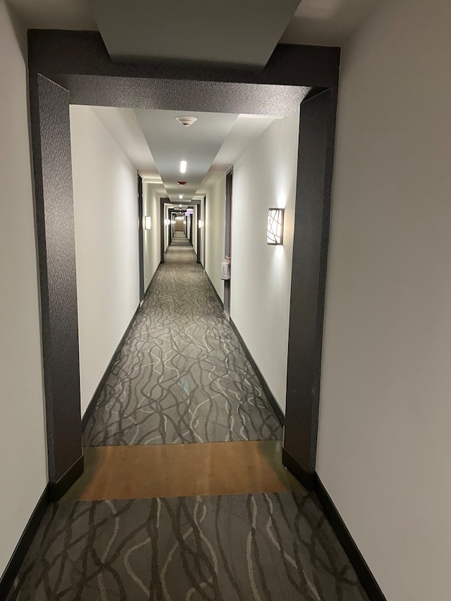 corridor with carpet floors