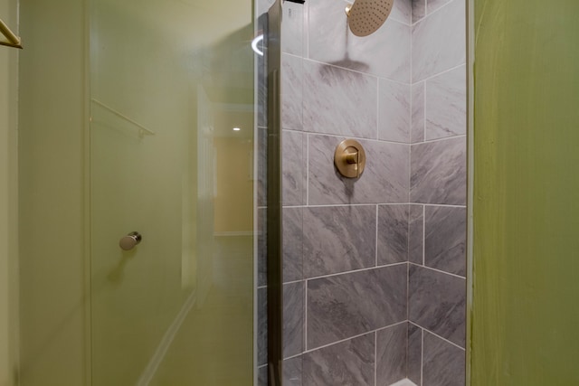 bathroom featuring an enclosed shower