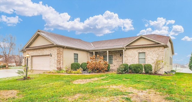 single story home featuring a front yard and a garage