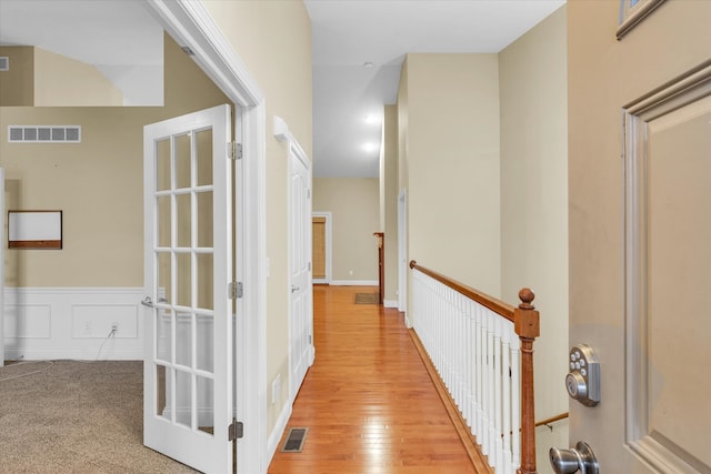 hallway featuring light wood-type flooring