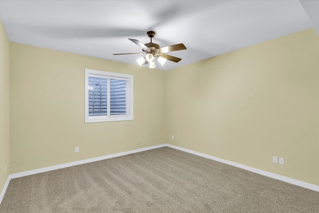 unfurnished room with carpet and ceiling fan