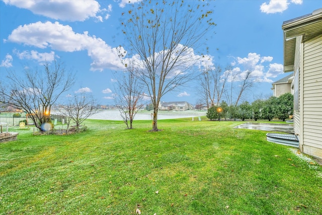 view of yard featuring a water view