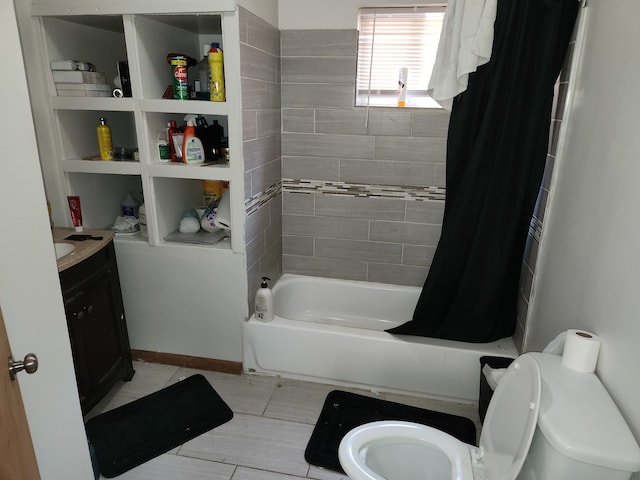 full bathroom with shower / tub combo, vanity, and toilet