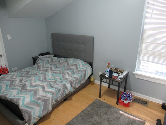 bedroom featuring hardwood / wood-style floors