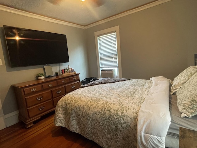 bedroom with dark wood-type flooring, cooling unit, crown molding, and a ceiling fan