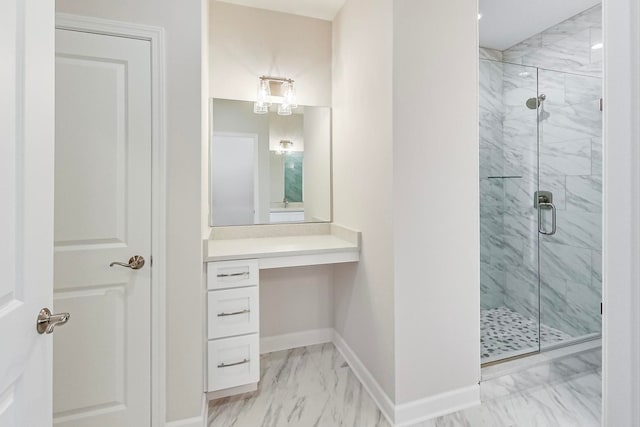 bathroom featuring tile patterned floors, vanity, and walk in shower