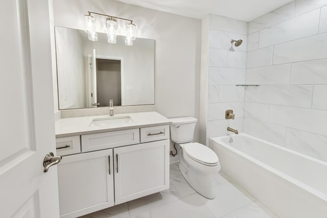 full bathroom featuring tile patterned flooring, tiled shower / bath, toilet, and vanity