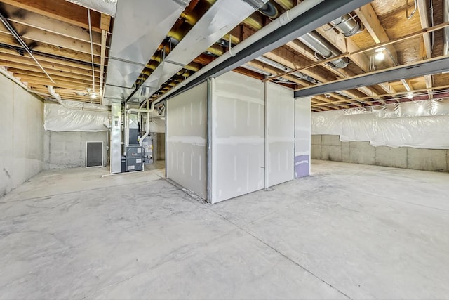 basement featuring heating unit